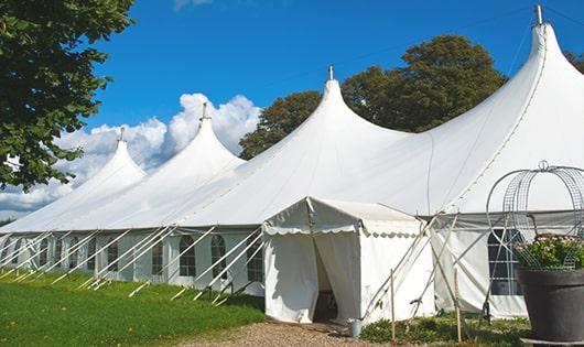 high-quality porta potties stationed at a wedding, meeting the needs of guests throughout the outdoor reception in Meriden